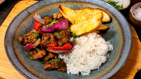 Filete de cerdo salteado a la peruana