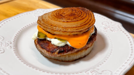 Hamburguesa de cerdo con cebolla