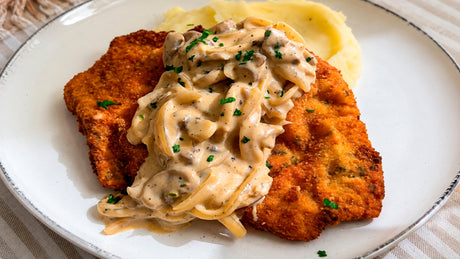 Milanesas de cerdo con salsa de champiñón