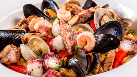 Paella jugosa con entrañas, lomo liso