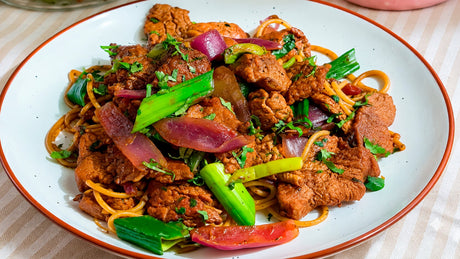 Tallarín saltado con cerdo