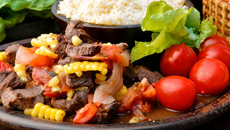 Tomaticán de posta negra de cerdo con arroz blanco